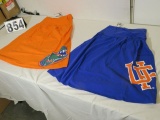 ladies dresses (32) orange with gator head logo and (32) blue with uof  logo assorted small to large