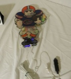 All Star Edition Lighted  Gated Football Player plugs in to cigarette lighter.. 8 inches high