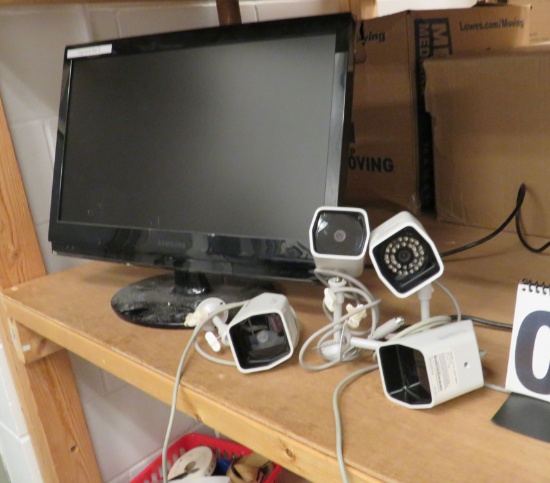 Security Camera System (16 security cameras, 2 20" monitors, and 2 remote controls)