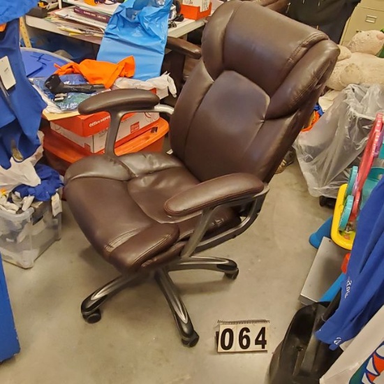 chrome framed office chair with brown vinyl upholstery