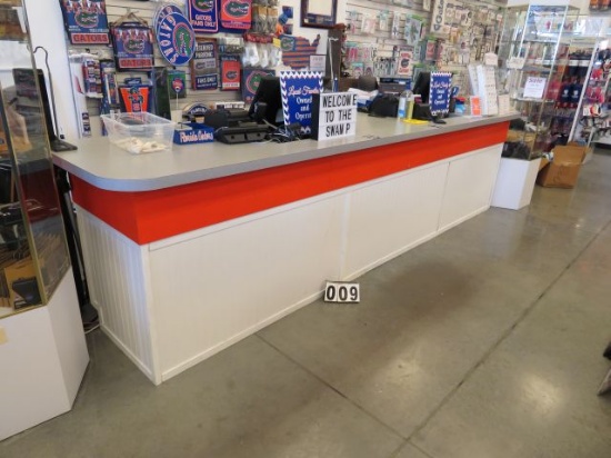 L shaped check out counter set up for two registers 140" overall length with a 84"left hand return t