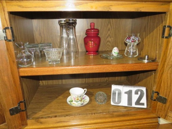 contents of china cabinet lower shelves