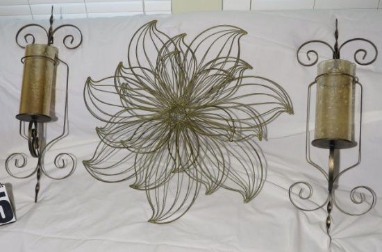 wall sconces and rattan decor piece