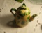 tea pot with a bee on it