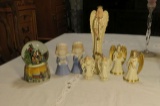 group of Christmas figures and globe