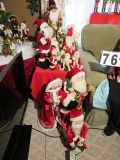 Collection of 14 Santa Clause dolls