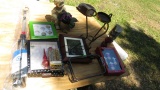 Sharps Pitch-it IV stand, Christmas decorations, digital clock,  pottery boy figure with florals