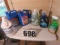 tote of mixed insecticides, cleaning products