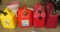 (3) gas cans, 5 gallon and (1) 5 gallon diesel gas can and (1) funnel