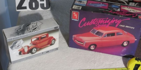 model cars in boxes