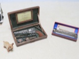 M.Hoener's auto-dash-valve-harmonica, and decorator pistol in box