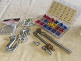 lot of terminal assortments, quick links, grab hooks and tire pressure gauges