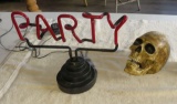 party lite up sign and skull