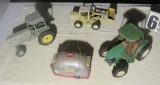 vintage toy tractors (2), backhoe, and Airstream (all metal but green tractor)