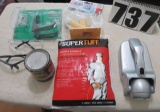 lot of assorted items: flag holder, two safety glasses, painter's coveralls, flashlight, etc.