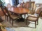 dining table with 6 matching chairs and extension leaf