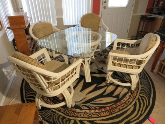 Rattan dinette set with glass top 4 matching chairs