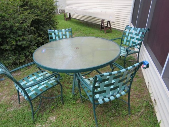 green patio table set with 4 vinyl web strapped patio chairs