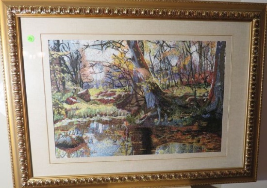 framed embroidered silk of a Fall stream in the woods