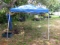 10' x 10' pop up tent with canvas carry bag (like new)