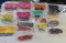 Assorted 15 packs of plastic fishing worms & 3 crank baits  NEW old stock