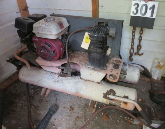 Honda GX160 gasoline powered 5.5 hp portable compressor.  (pulls through with compression did not ru