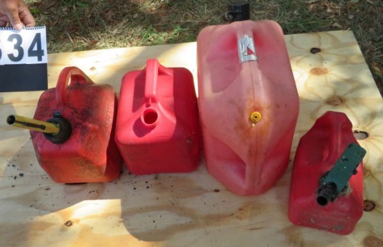 group of 4 plastic gas cans mixed capacity
