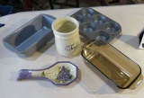 Pyrex bakeware, 2 muffin tins, 2 metal breadpans, spoon rest and utensil holder