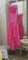 Hot Pink Xtreme strapless prom dress.  This high-low style dress has one loose sequin, easily repair
