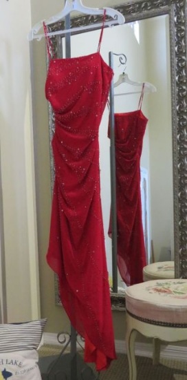 Red B' Dazzle, size 4, spaghetti-strapped dress with angled bottom.  New with no tags... some thread