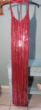 Wow! Size 12, sequins galore.  Berry, berry beautiful dress with slit in front. New with tags.