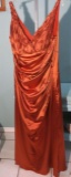 16 W, Xcite, Burnt Orange beaded formal dress. Perfect for any occasion.  Bust 47l Waist 41.5; Hips