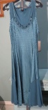 L Komarov, Ultra Marie, fits size 10/12. Beading around the neckline. New with tags. Perfect dress f