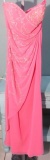 Size 8, Xcite, pink strapless evening dress.  Bust: 36; Waist 27.5; Hips 39. New with tags.