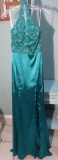 Riva Designs special occasion dress, size 4, teal green, halter style.  One seam needs repairing.  B