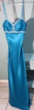 Gigi, size 8, teal adorned with rhinestones with spaghetti straps. New dress with tags. Bust 37; Wai
