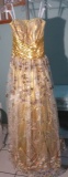 Riva Designs,  size 6, gold champagne strapless dress. Prom and Qunicenera.  Bust 35; Waist 27; Hips