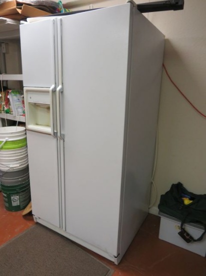 white site by side refrigerator freezer