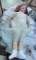 Large Doll Vintage porcelain face, plastic jointed limbs, good condition 32'H, shoes, socks cloth dr