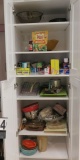 Heat treated cookware, plasticware, cutting boards, and supplies in pantry cabinets