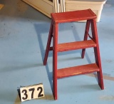 2 ft red wooden step ladder