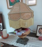 globe lamp with ornate fringe tassel shade