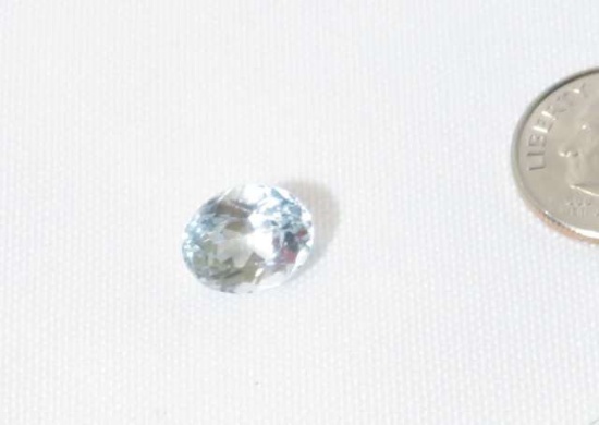 very light blue topaz 4.46 cts brilliant oval cut .33mm x .35mm