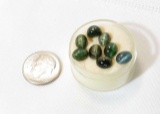 oval cabochon cut dark green to pink opaque tourmaline gemstone total weight for all 8.69 ct.