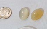 oval cabochon cut white and pink white moonstones 28.65 cts total weight
