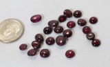 oval cabochon cut red purple garnet gemstones total weight 20.53cts