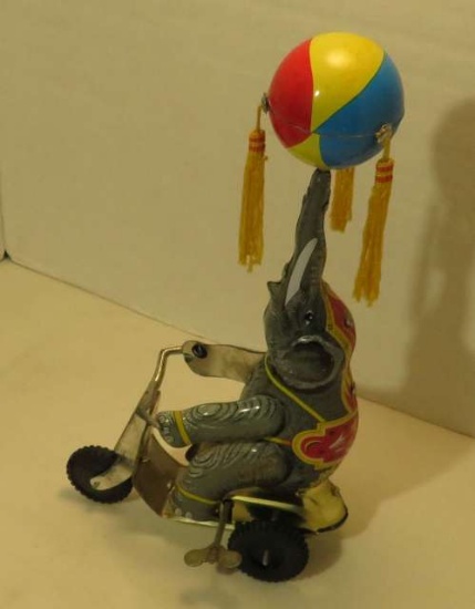 Wind up tin elephant with spinning ball propeller Mfg.  China. functions