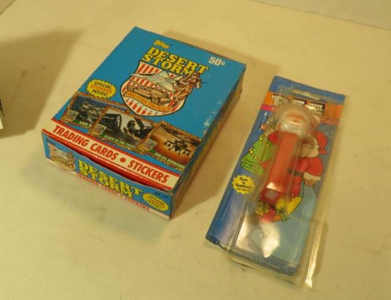 Box of Desert Storm Trading Cards and Stickers with a Santa Claus PEZ Dispenser