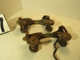 Vintage childrens steel ball bearing strap on roller skates