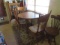 drop  leaf oak dining table with 4 oak dining chairs